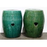 Pair of Chinese green glazed porcelain stools, the sides molded with floral roundels, the top with a
