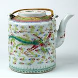 Chinese enameled porcelain teapot, of cylindrical form featuring a pair of dragon and phoenix amid