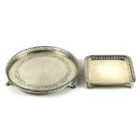 (lot of 2) Sterling silver tray group, consisting of a Howard & Co. New York example, having a