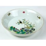 Chinese enameled porcelain dish, interior decorated with various insects amid rocks and foliage, the