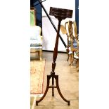 Georgian style mahogany plant stand, having a circular top, above a turned standard, and rising on a