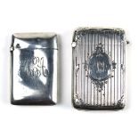 (lot of 2) Edwardian sterling silver match boxes, each with a hinged lid and ribbed strike, having