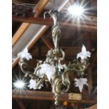 Art Nouveau six-light patinated bronze chandelier, having frosted glass rosette shades, 29"h.