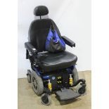 Jazzy electric wheelchair with charger, 48"h x 26"w x 26"d