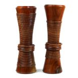 Pair of Howard Lewin turned walnut candle holders executed in 2000, each with a tapered form fronted