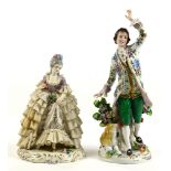 (lot of 2) Continental porcelain figural groups, one an Italian crinoline figure depicting a beauty,