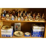 (lot of approx. 37) Two shelves of Hummel figurines and collector plates, with various date