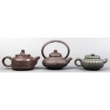 (lot of 3) Chinese zisha ceramic teapots: first, of dark green clay executed in a lobed squash form,