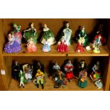 (lot of 24) Two shelves of mostly Royal Doulton figurines, including "Lavinia," "Chloe," "'Owd