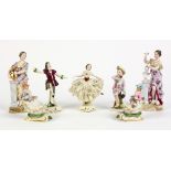 (lot of 7) German porcelain figural groups, depicting figures in period attire taking part in