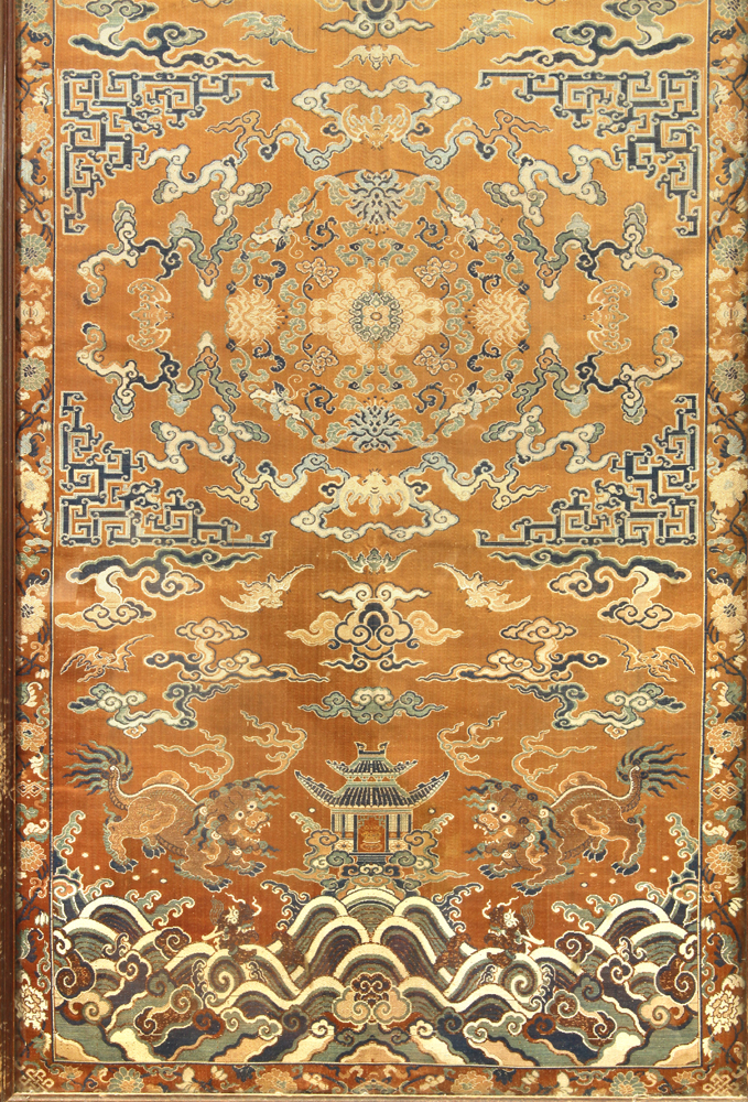 Chinese orange ground brocade silk chair cover, featuring a meandering gilt dragon, above a floral - Image 3 of 3