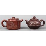 (lot of 2) Chinese zisha teapots, the first of a compressed body molded with reserves of teapots