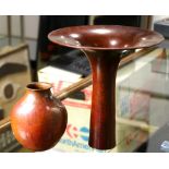 (lot of 2) Copper vase group, one having a tall form with a circular lip, the other smaller, in