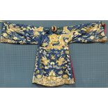 Vietnamese blue-ground silk court robe, 19th century, featuring a pair of large four-claw dragons