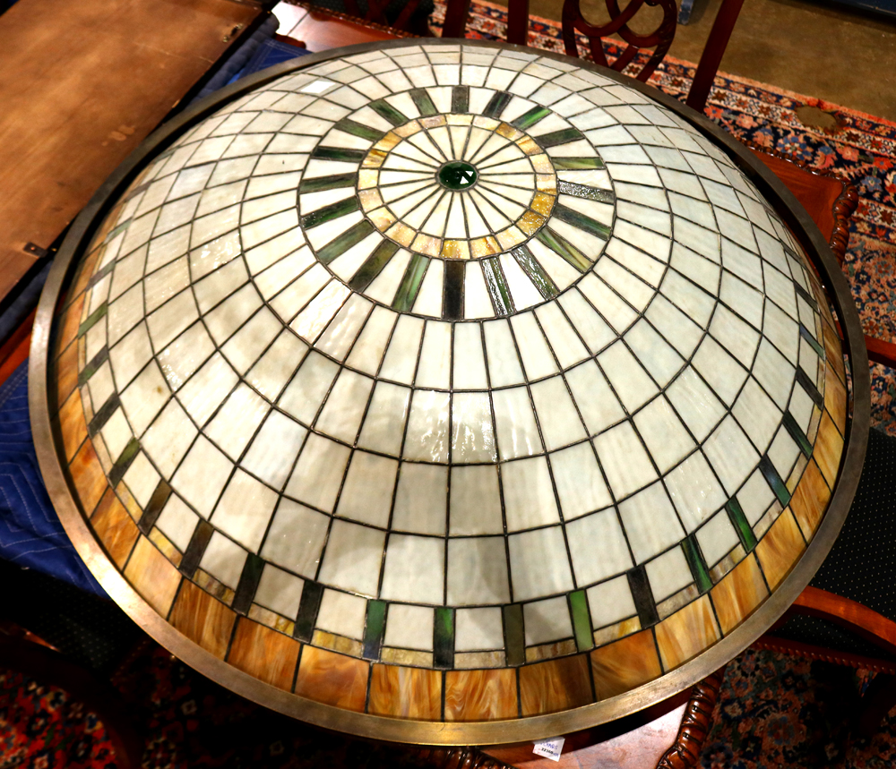 Arts and Crafts style leaded glass pendant lamp, having a dome form with carmel, cream and green
