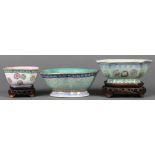 (lot of 3) Chinese enameled porcelain footed bowls, two with floral roundels; and one of tri-lobe