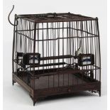 Chinese wooden square bird cage, of splayed form above the slide out base panel, raised on four