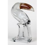 Daum Toucan sculpture, having a pate de verre amber beak, frosted facial features, and a clear body,