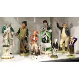 Collection of figurines including a Charles Dickens Mr. Pickwick and Sam Weller figures, a Royal