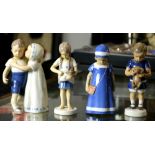 (lot of 4) Bing and Grondahl figurines depicting children, each marked on underside, largest: 7.5"h