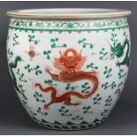 Chinese enameled porcelain fish bowl, decorated with meandering dragons of green, pink, and orange