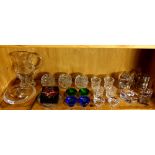 (lot of 21) One shelf of glass including Orrefors votive holders, a Gorham pitcher, etc.
