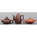 (lot of 3) Chinese zisha teapots: first, of a long lobed form, base marked 'Tang Xiaofen'; second,