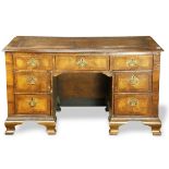 George III desk circa 1770, executed in walnut, having reticulated brass pulls, the fronts with