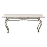 Moderne outdoor console table, having a rectangular granite top, above scrolled painted metal