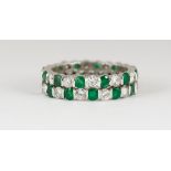 Tiffany & Co. emerald, diamond and platinum eternity band Composed of (2) eternity bands, attached