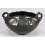 Large Santa Clara blackware bowl, early 20th Century, the slightly compressed bulbous form flanked