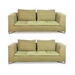 (lot of 2) Ligne Roset two piece sofa set, each having beige upholstery above a sage green seat, and