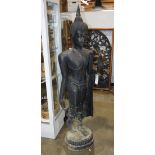 Thai large Sukhothai-style bronze Buddha, draped in monastic robe in mid-step, on a lotus pedestal