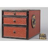 (lot of 2) Japanese vermilion/black lacquered chest, with three katana tsuba attached to exterior of
