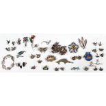 Collection of abalone, obsidian, enamel, glass, sterling silver, silver-gilt, silver and metal