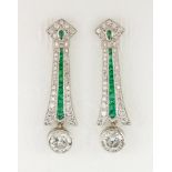 Pair of diamond, emerald and platinum earrings Featuring (2) round brilliant-cut diamonds,