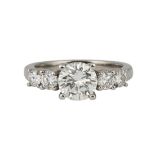 Diamond and 18k white gold ring Centering (1) round brilliant-cut diamond, weighing 1.50 cts.,