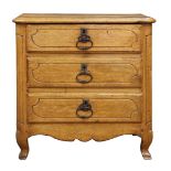 French Louis XV fruitwood commode circa 1770, having a three drawer case with wrought pulls, and
