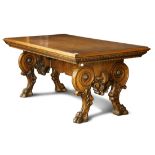 Continental Renaissance style library table, having a rectangular top above the keyed trestle base