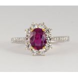 Ruby, diamond and 18k white gold ring Centering (1) oval-cut ruby, weighing 1.23 cts., accompanied