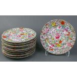 (lot of 10) Chinese enameled porcelain plates, of mille fleur pattern, the base with apocryphal
