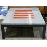 Modern coffee table, having a metal frame and inset painted ironstone top, 16"h x 36.5"w