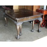 Jacobean style dining table with (7) 26.5"l leaves, having a rectangular top above cabriole legs