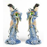 Pair of Chinese porcelain figures, of two celestial beauties with flower baskets, interior base