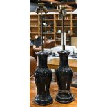 Pair of porcelain shouldered table lamps, each having a black glaze, 34"h