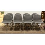 (lot of 8) Arne Jacobsen style swivel dining chairs, each having grey upholstery and rising on a
