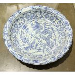 Chinese underglazed blue porcelain charger, with an everted foliate rim and an apocryphal Yuan mark,