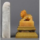 (lot of 2) Chinese soapstone seals: the first, a mythical beast above a square plinth, with stand;
