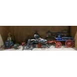 One shelf of toys including a Trick Pony bank, a Patrol carriage with horses, etc. largest 20.5"l