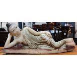 Burmese stone parinirvana Buddha, in reclining pose, with pigment accents, 26.5"l